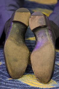 LONDON, UNITED KINGDOM - OCTOBER 05:  A close-up of brass shoe tacks forming the letter "H"  on the soles of Britain's Prince Harry's shoes as he kneels to speak with award winners whilst attending the WellChild Awards, which recognises the courage of seriously ill children, at the London Hilton on October 5, 2015 in London, England. (Photo by Justin Tallis - WPA Pool / Getty Images)